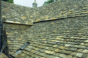 New Cotswold stone tile roofers Marlborough, cast iron roof lights fitted Swindon, replacement stone tiled roofing contractors in Swindon