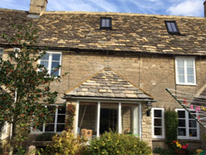 New Cotswold stone tiled roof